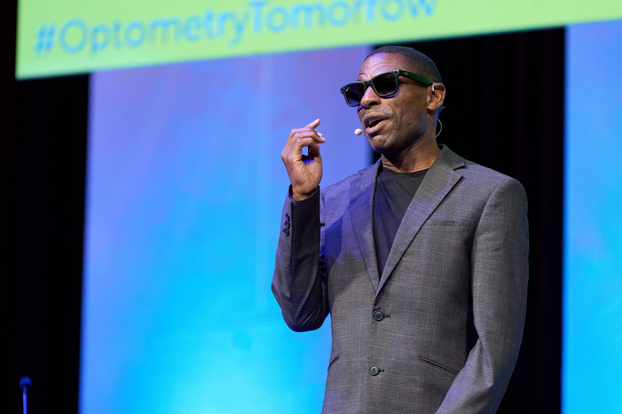 Darren Harris speaking on stage